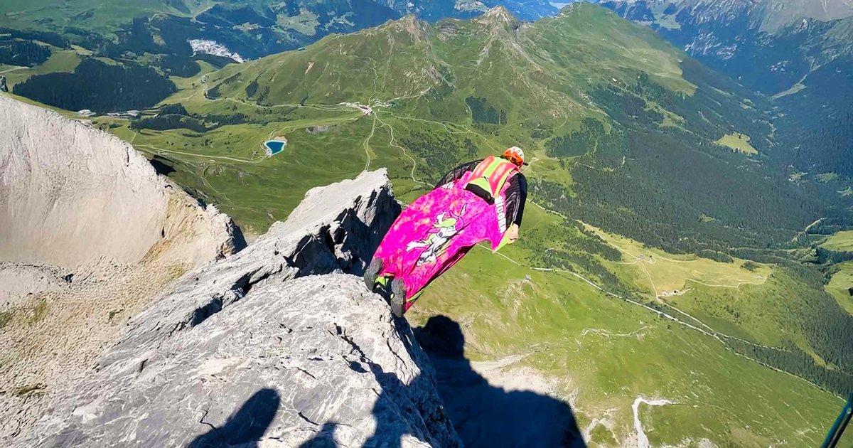 Full-frame BASE jump in flight, why Jamie Leibert replaced prison therapy with extreme sports